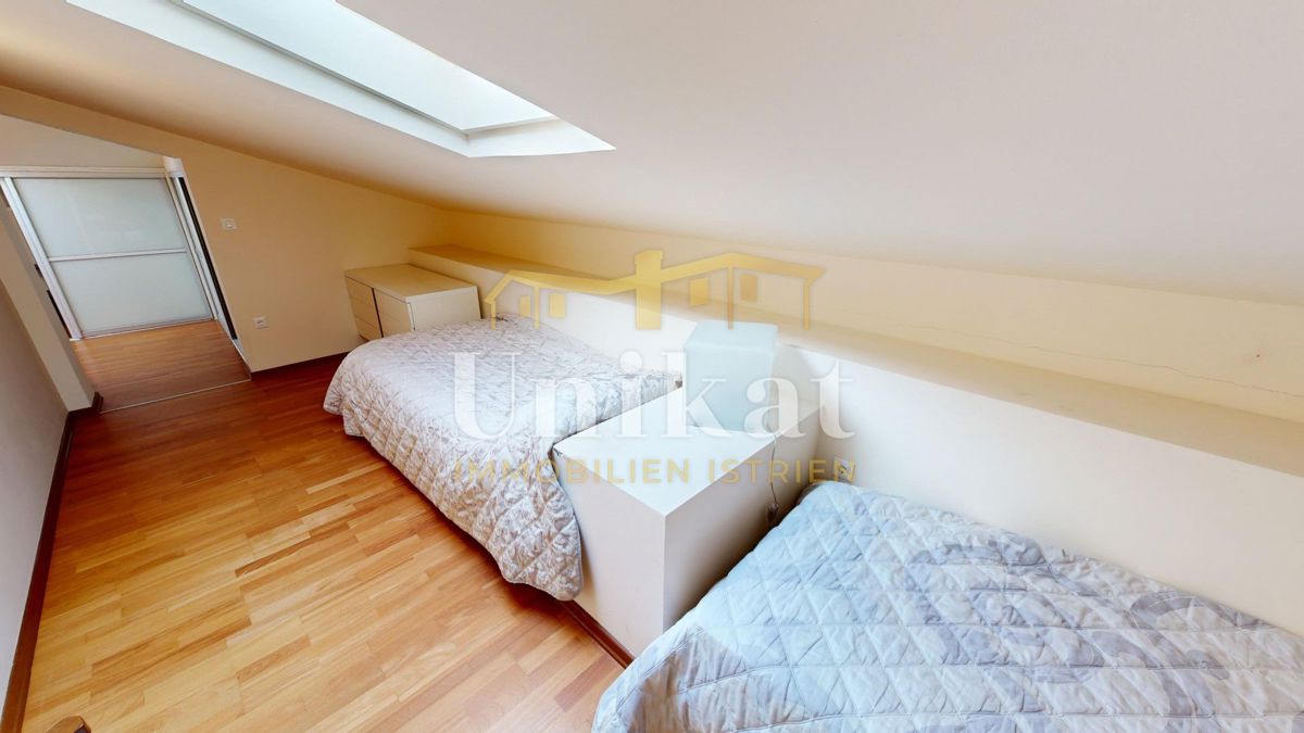 Appartamento su due piani con 4 camere da letto